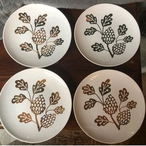 Brand new rose gold/gold pine one plates.
